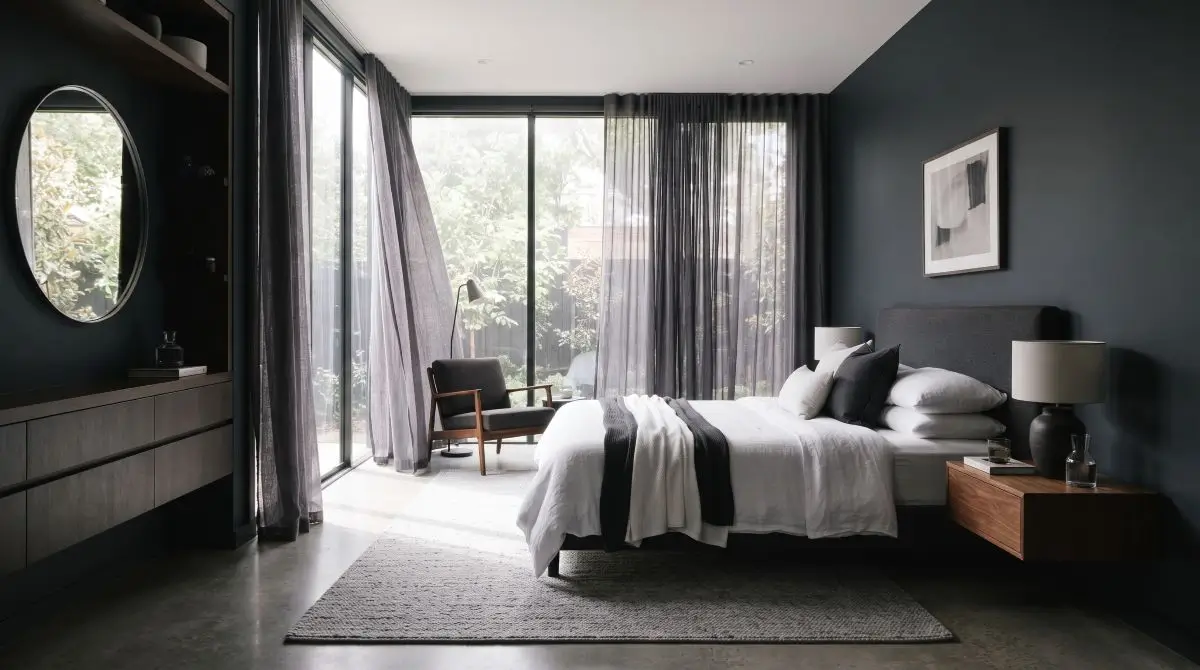 Dark Bedroom Highlighting Natural Light